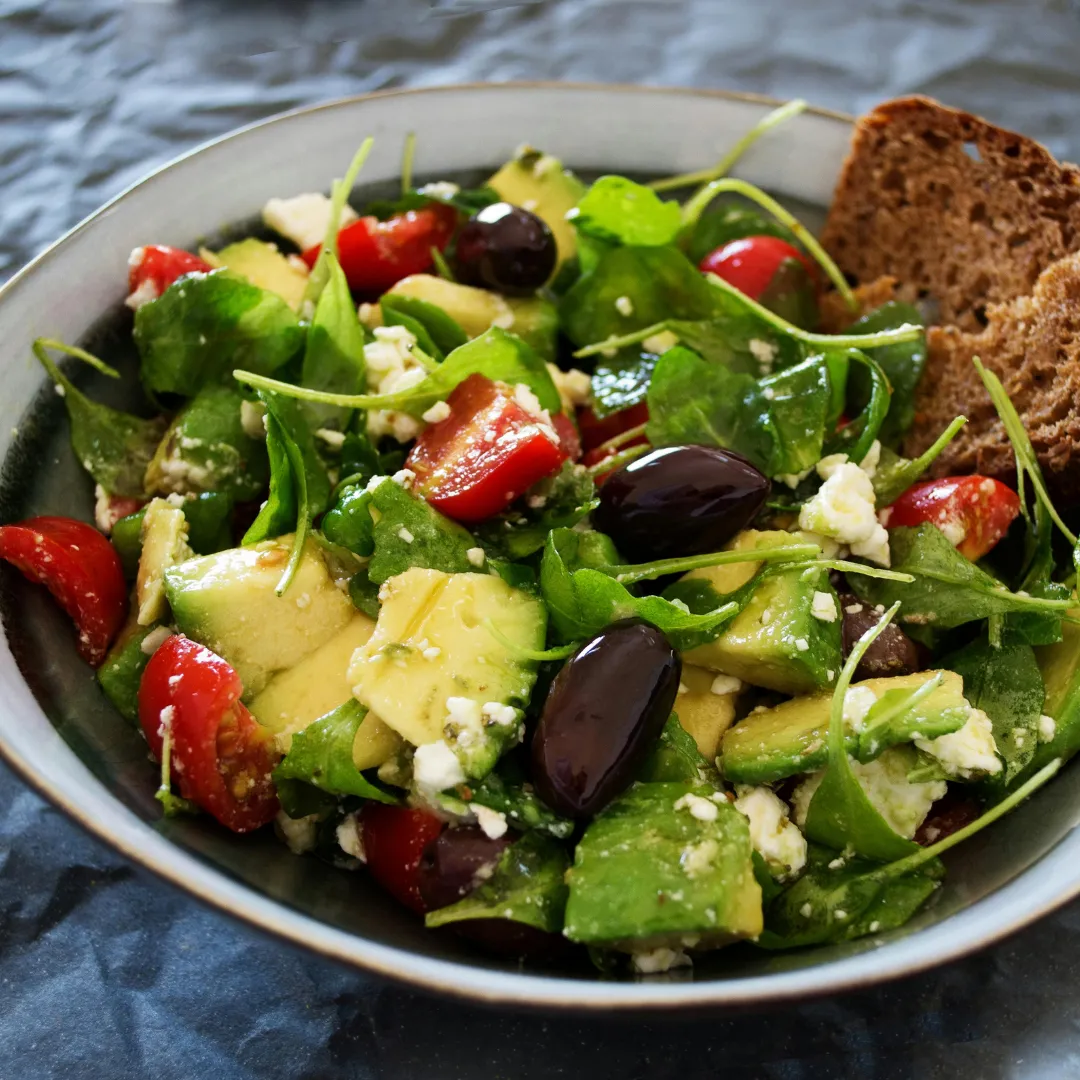 Fresh avocado, tomato and olive salad