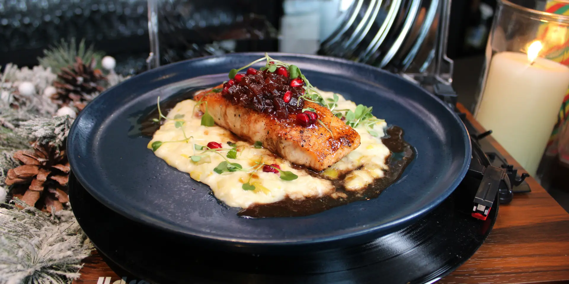 Salmon served over creamy potatoes